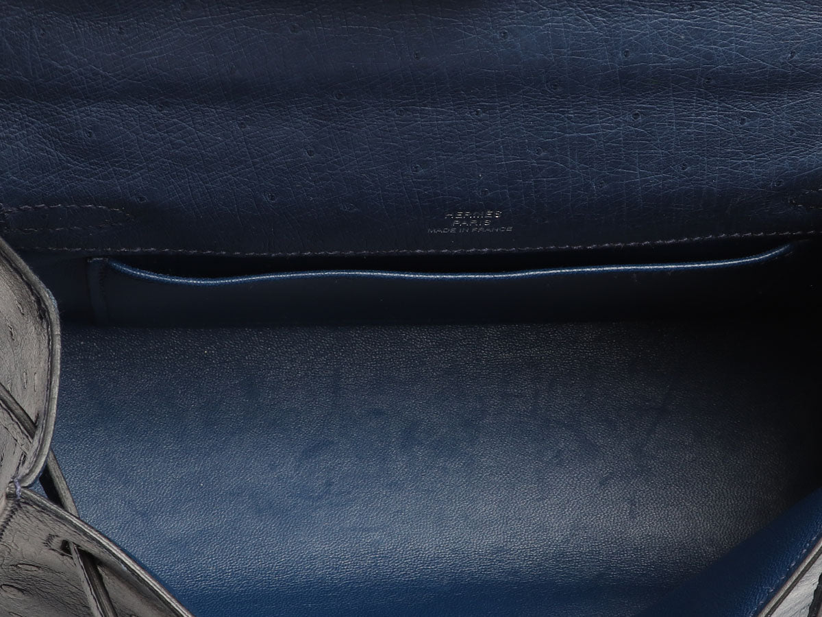 Kelly Pochette Clutch Bag crafted from top-layer cowhide with ostrich pattern